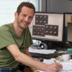 : Image of Sjors Scheres at his desk.