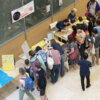 Visitors taking part in Exploring the Human Brain with Organoids