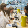 Girls and woman at See your Cells activity