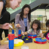 Woman and girls at Cellular Machines in 3D