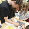Woman and children at Exploriong the Human Brain with Organoids