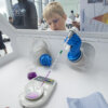 Boy taking part in the Pipetting Challenge at the Hands On Lab